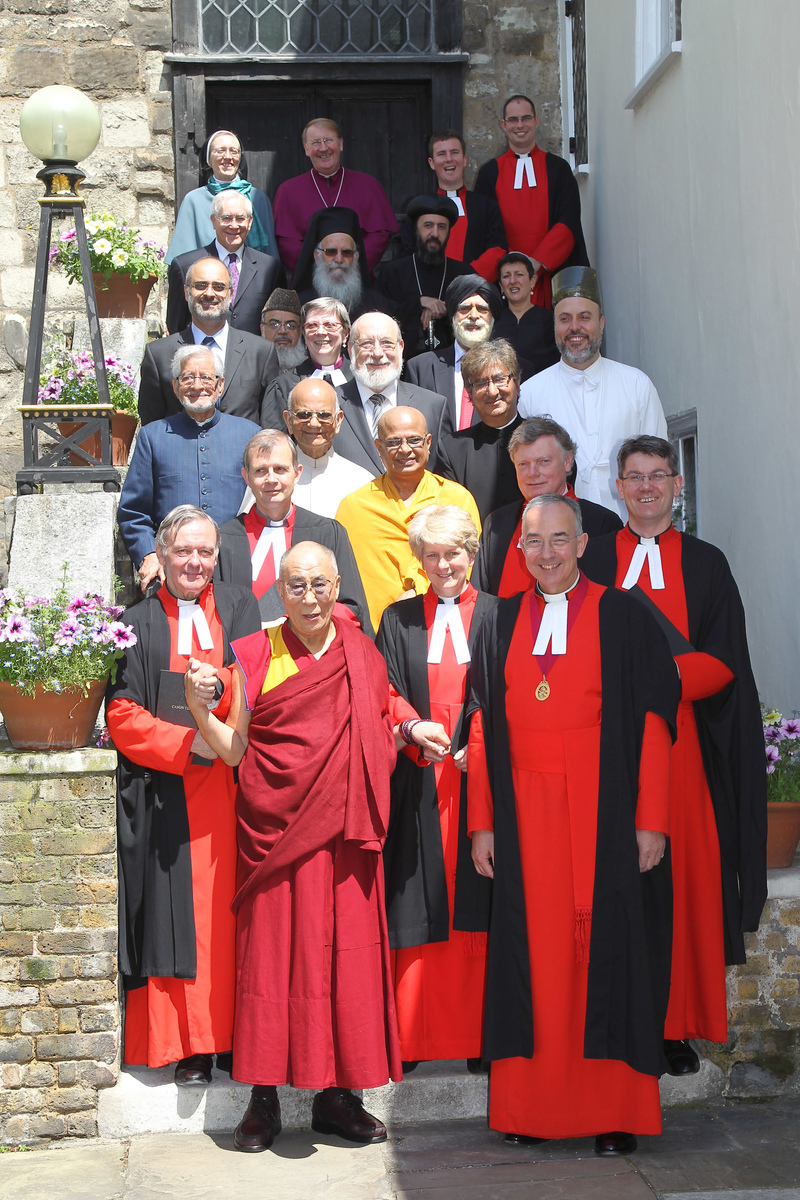 The Dalai Lama with Westminster Abbey clergy and faith representatives gather on the Deanery steps