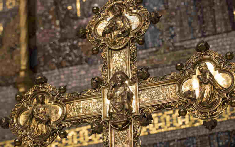 Close-up photograph of gold crucifix